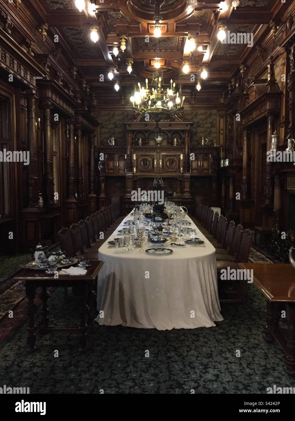 Peles Castle, Sinaia, Transylvania, Carpathian Mountains, Romania. September 2022, interior view 9. Grand Dining Hall. - Smartphone Captured Stock Image