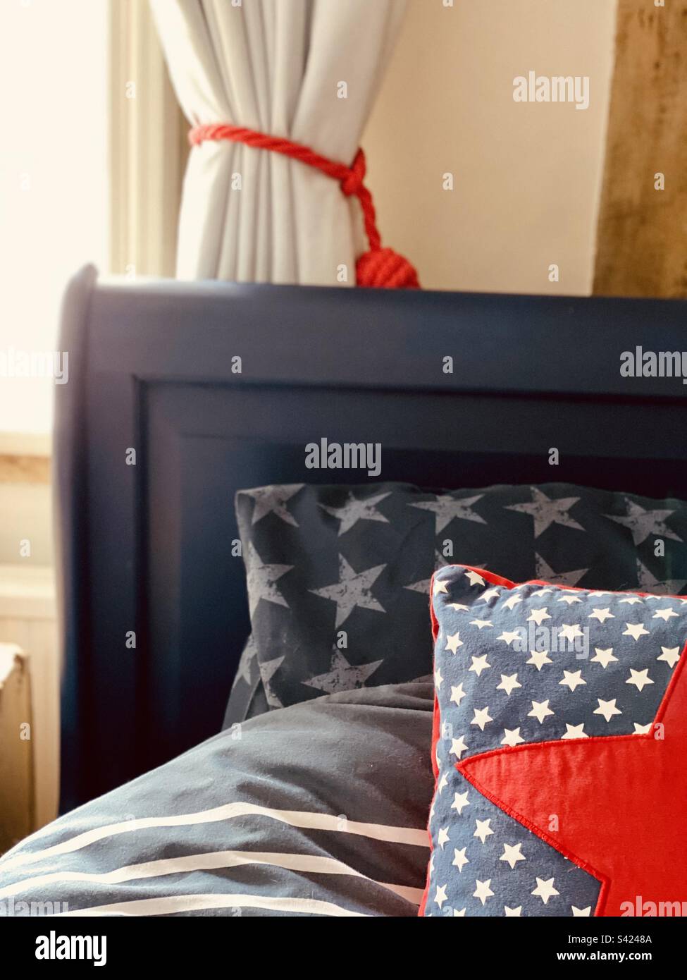 Detail of painted sleigh bed - Smartphone Captured Stock Image