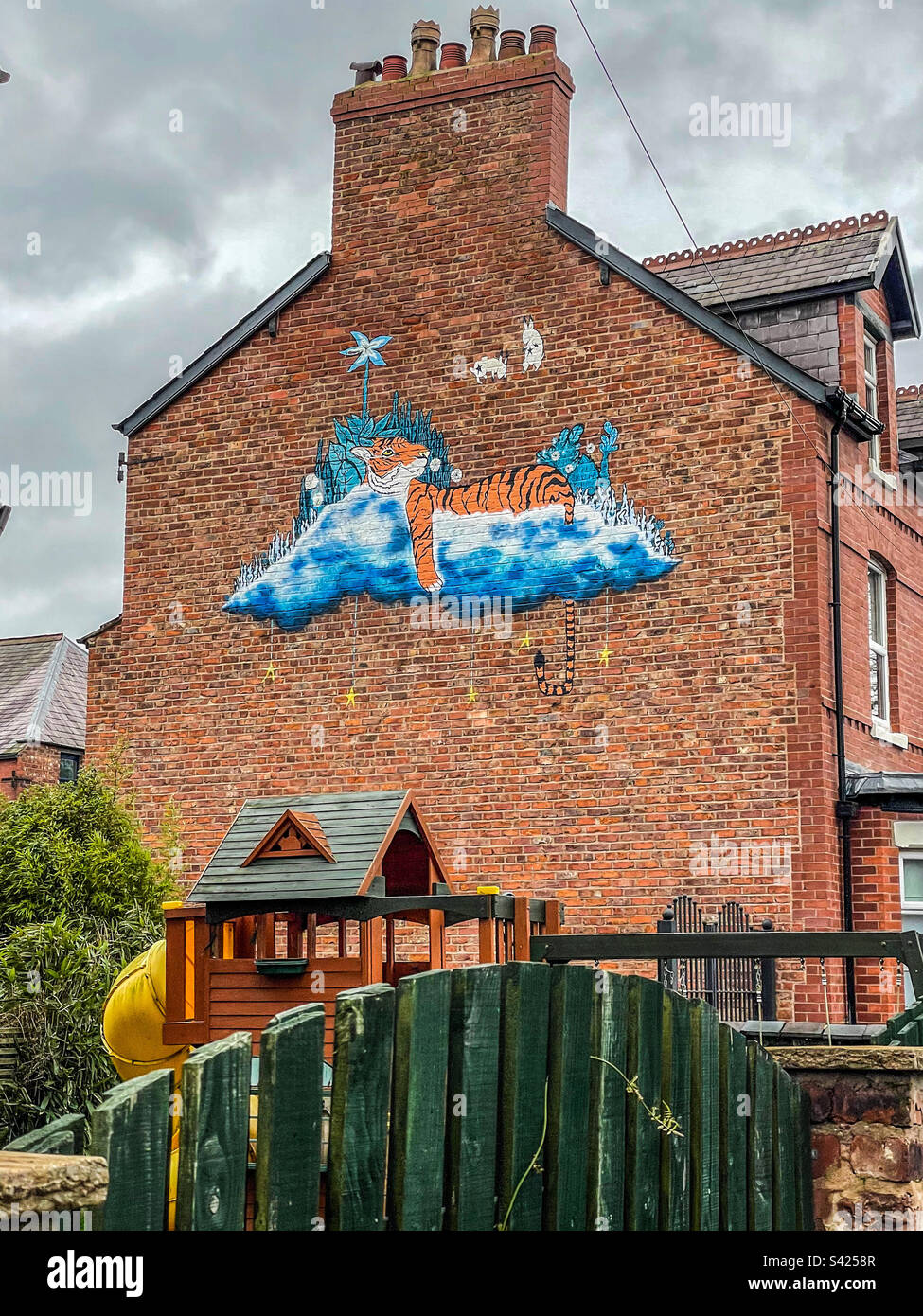 Children’s mural on side of a house Stock Photo Alamy