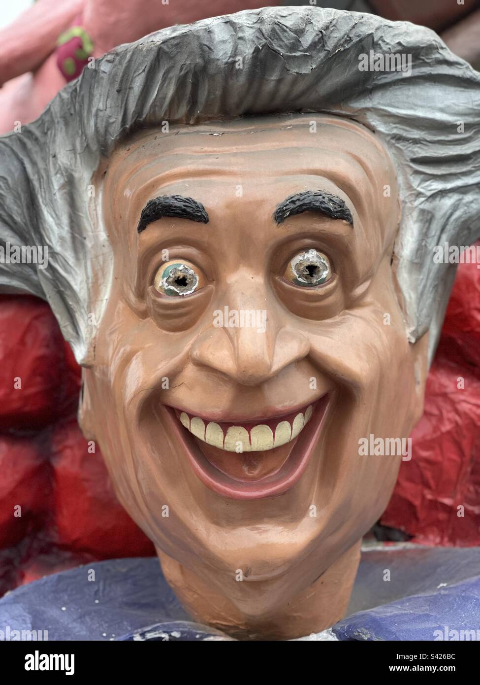 Funny carnival paper marche laughing man - Smartphone Captured Stock Image