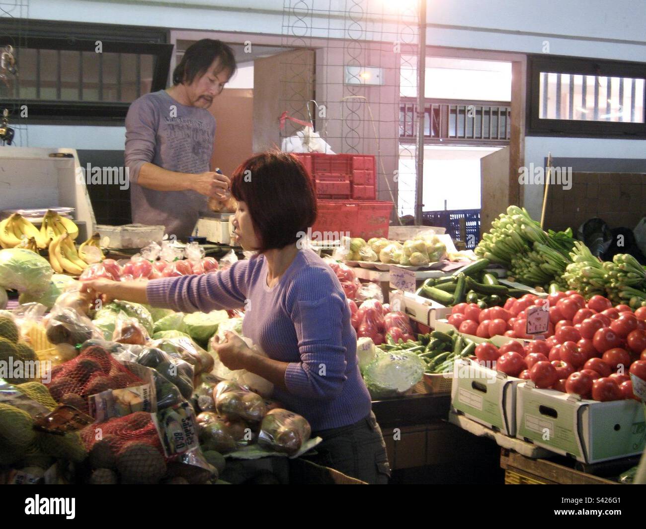 Shopping at Asian food market Stock Photo - Alamy