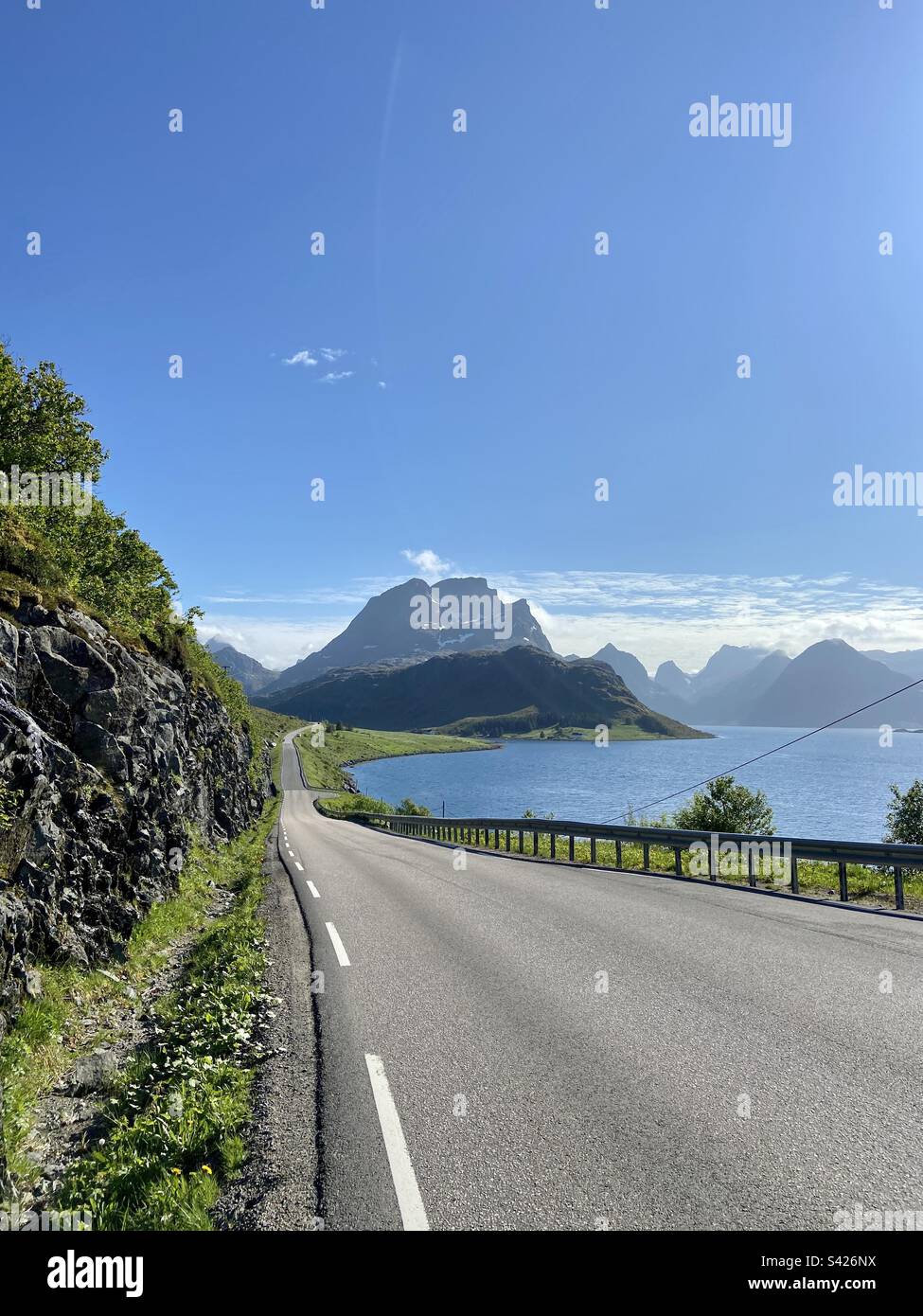 Roadside view while on the road trip in Lofoten islands, Norway on a sunny summer day. - Smartphone Captured Stock Image