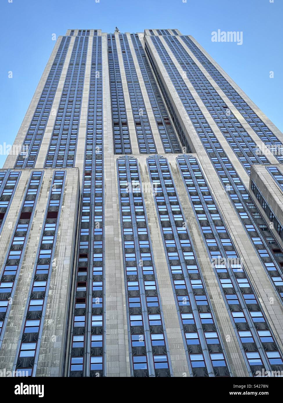 Exterior view of the Empire State Building during the day. Photo taken