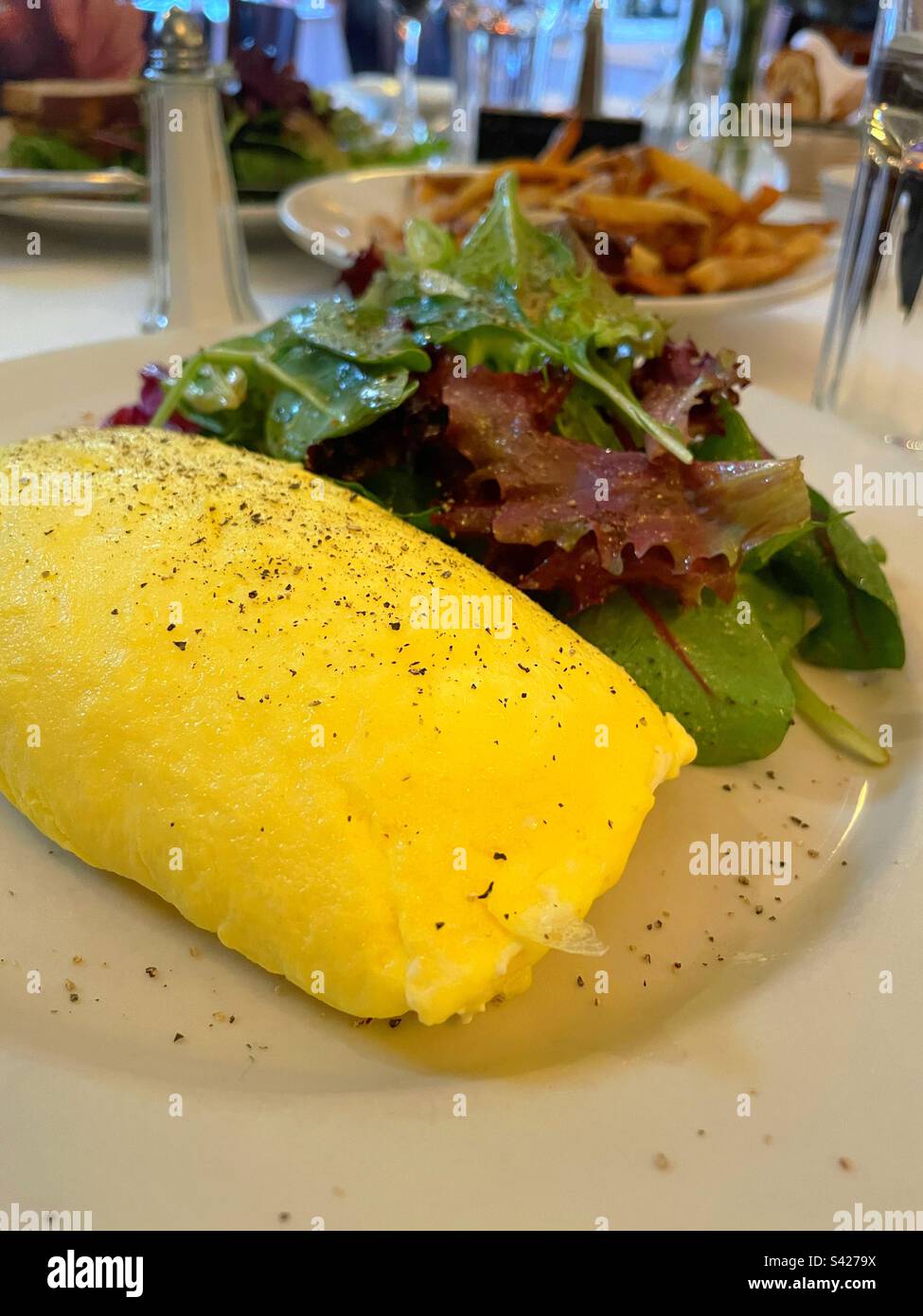 A fluffy omelette as part of a delectable brunch at a French bistro in Soho, 2023, New York City, United States - Smartphone Captured Stock Image