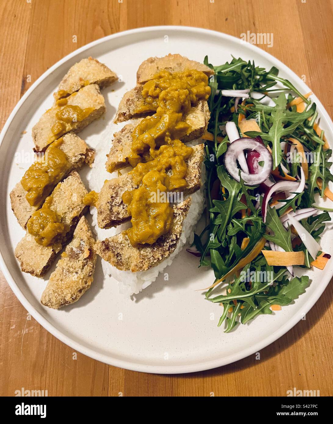 Vegan Katsu “chicken” and side salad Stock Photo Alamy