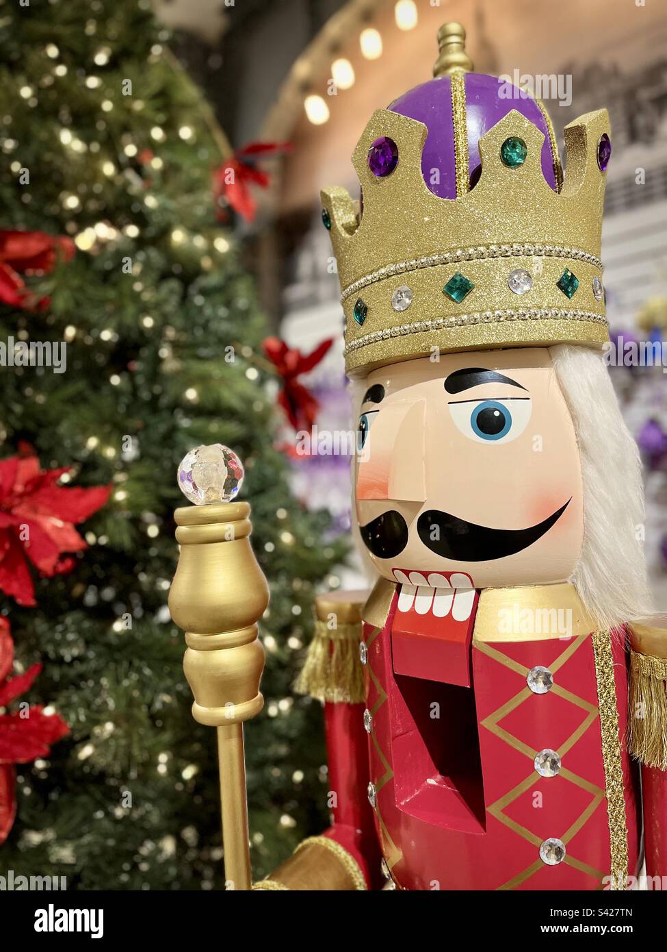 Closeup of a Christmas decor with a Christmas tree and a nutcracker