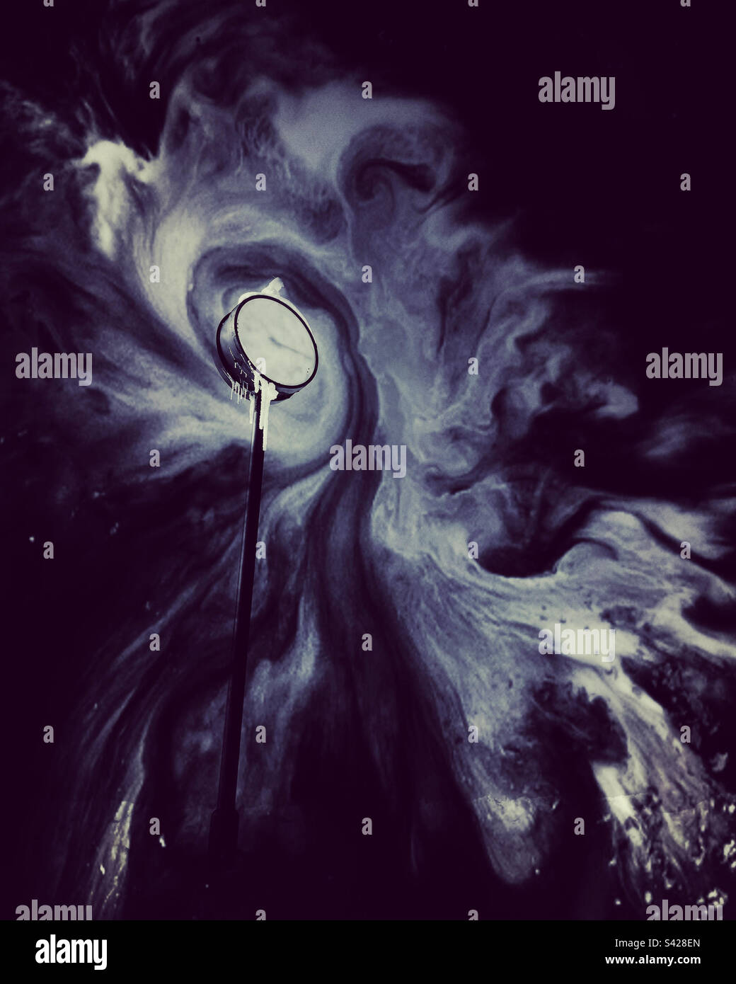 Frozen clock surrounded by black and white swirls - Smartphone Captured Stock Image