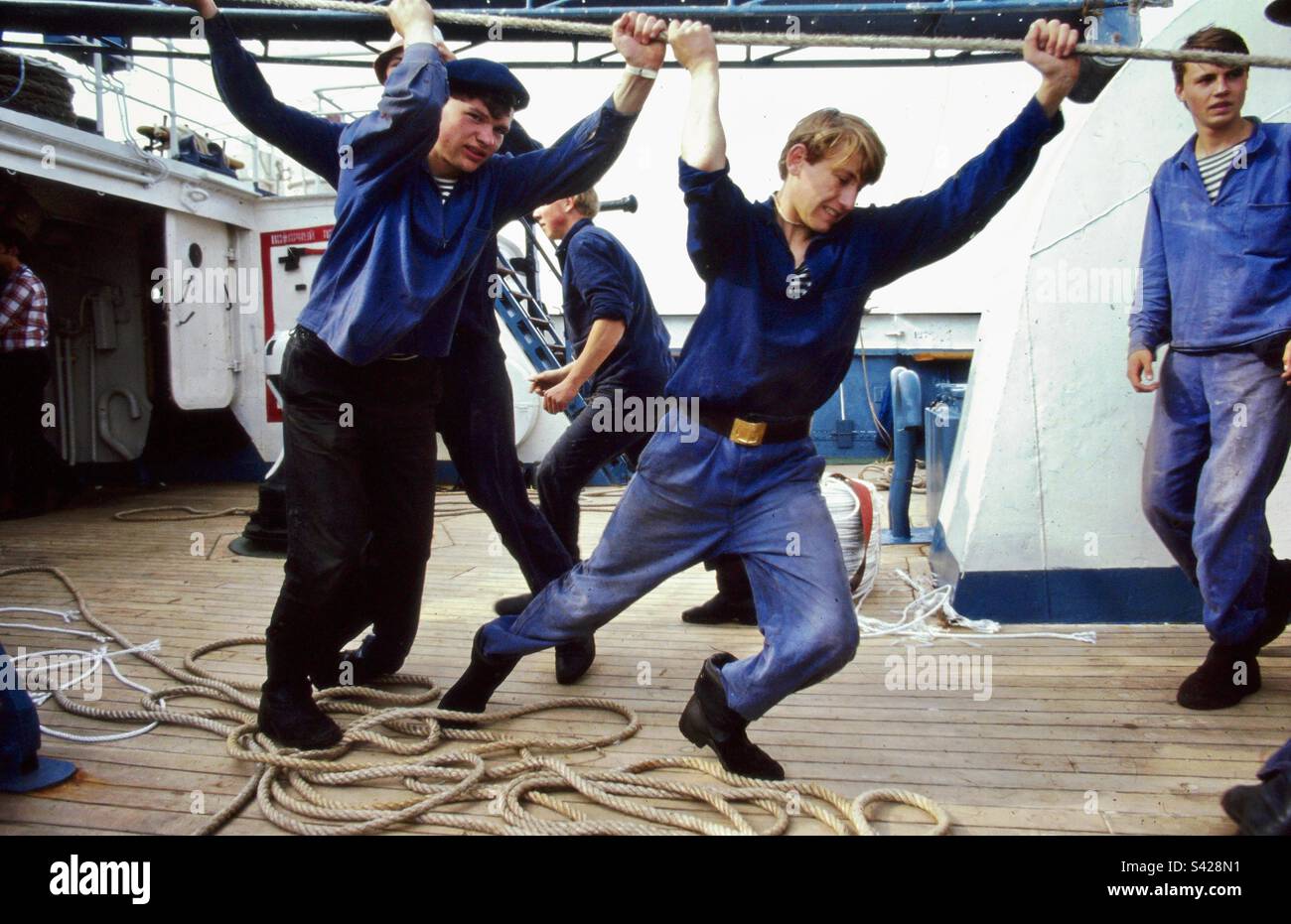 Crew of Russian sail training ship Kruzenstern erecting sails during the Tall Ships Race - Smartphone Captured Stock Image