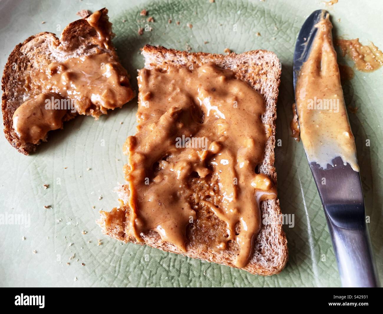 Crunchy peanut butter on toast Stock Photo Alamy