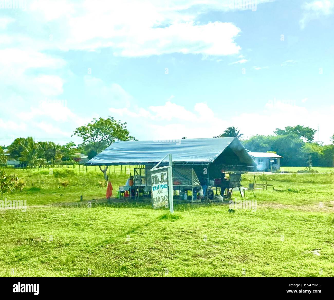 Roadside food stall serving BBQ in Belmopan, Belize - Smartphone Captured Stock Image