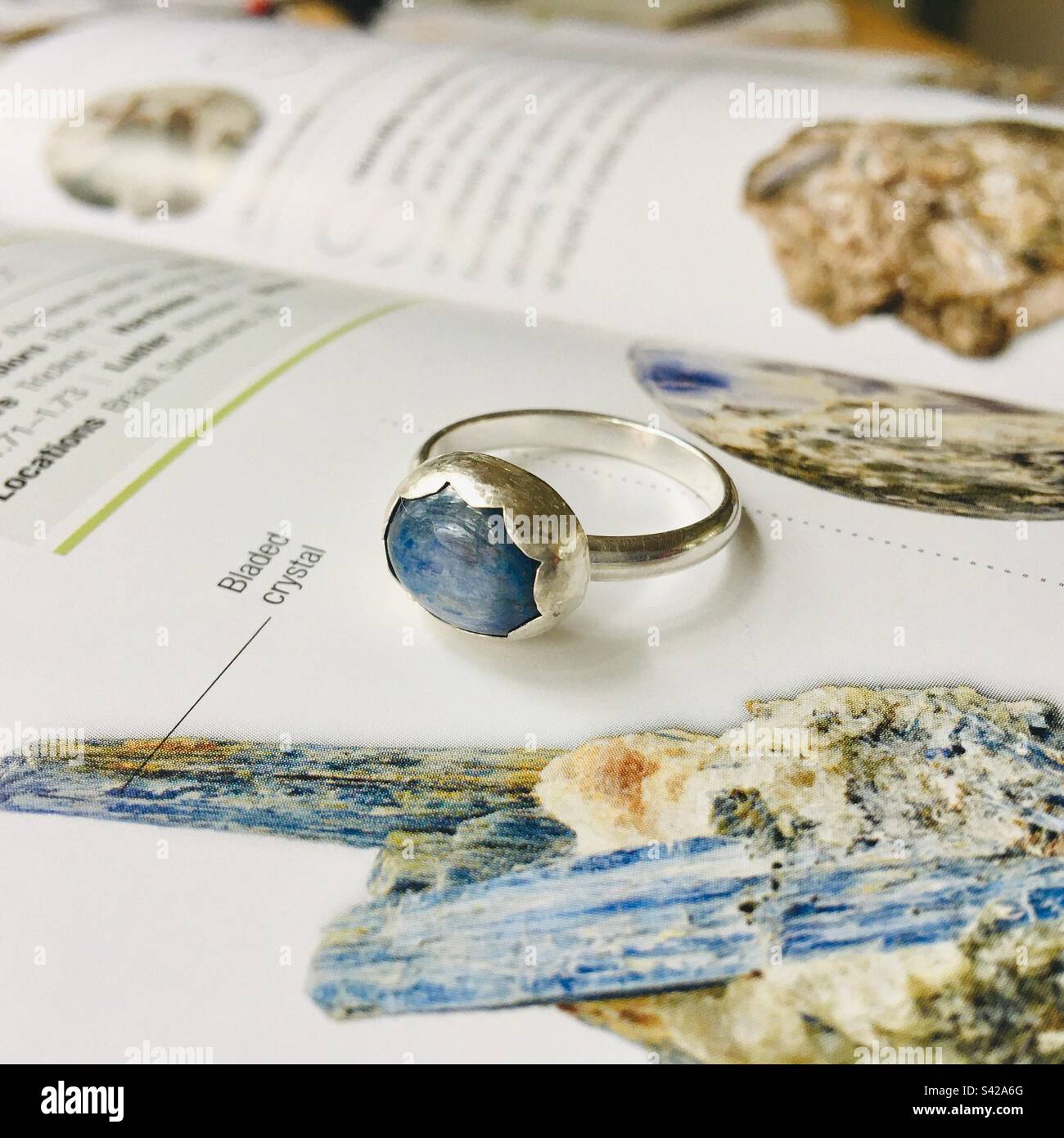 Sterling silver hand fabricated blue kyanite ring with scallop bezel