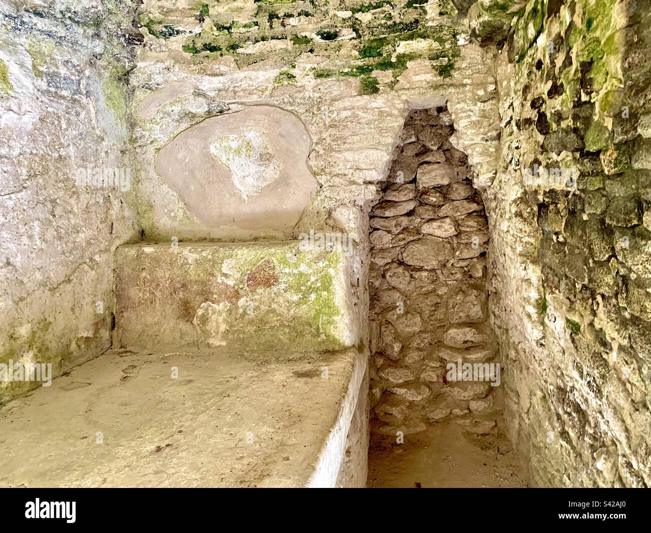 Bedroom chamber in a ruin at the ancient Mayan site Cahal Pech in Belize. - Smartphone Captured Stock Image