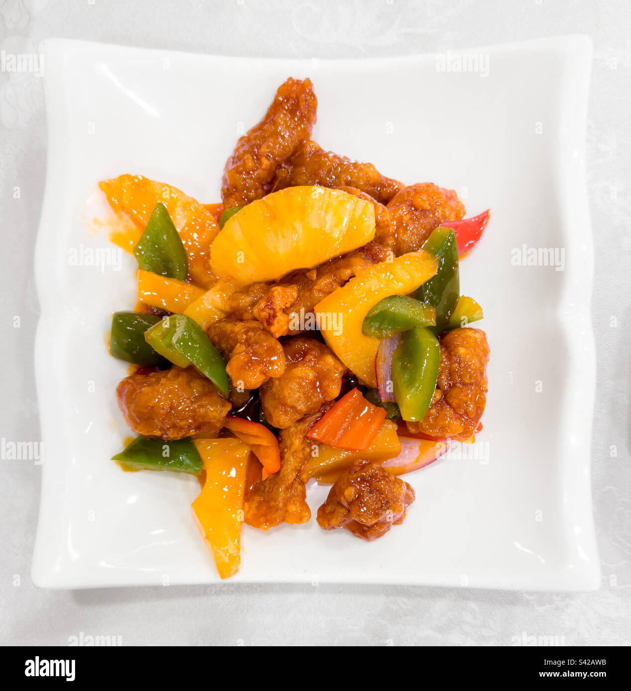 Plate of sweet and sour fish, a Cantonese specialty in Hong Kong - Smartphone Captured Stock Image