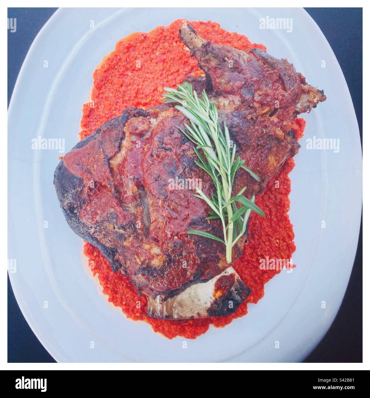 BBQ lamb shoulder Stock Photo - Alamy