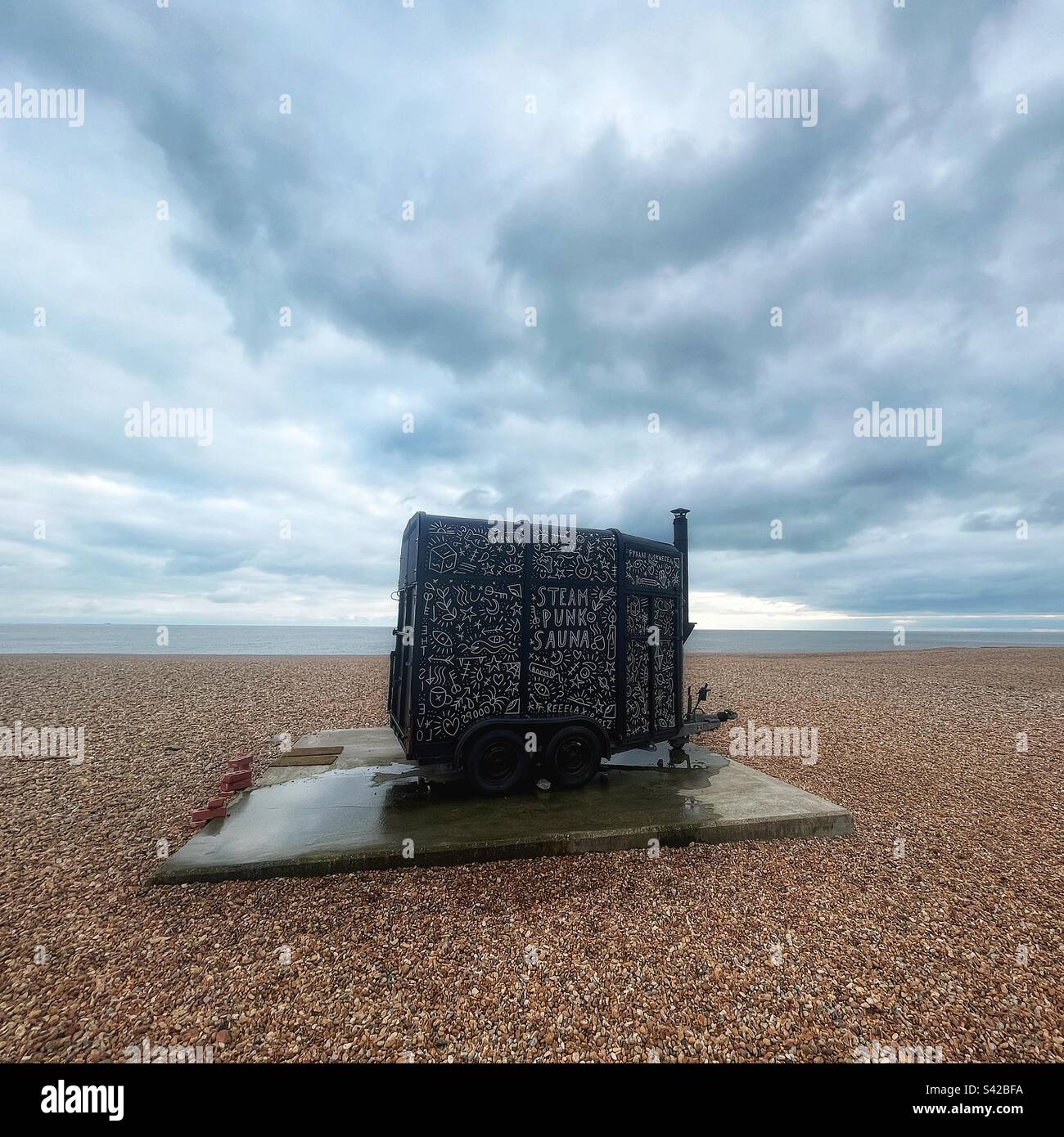Steam Punk sauna on the shingle beach at Folkestone, Kent Stock Photo