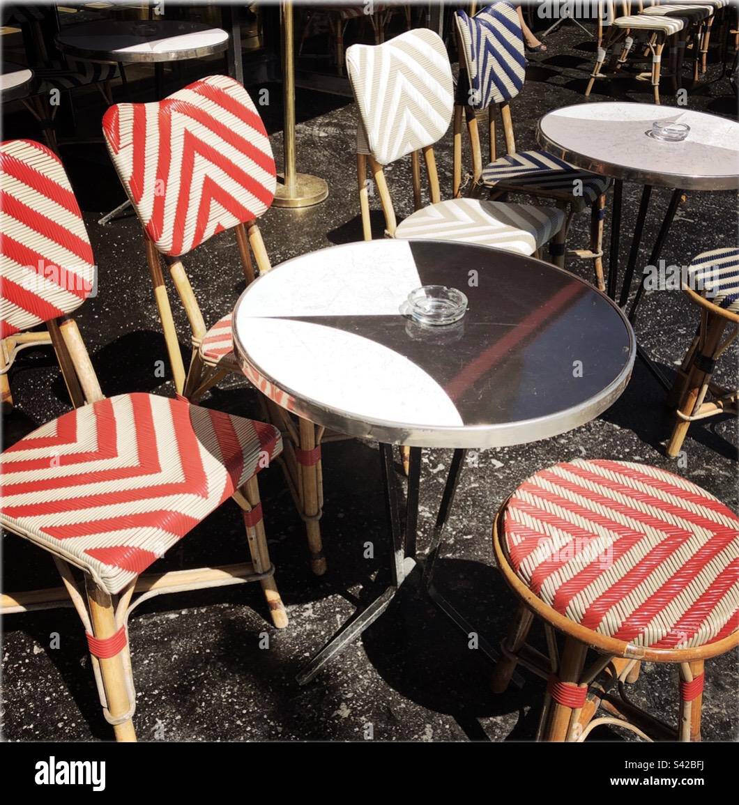 Table and chairs outside bistro, Paris, France Stock Photo Alamy