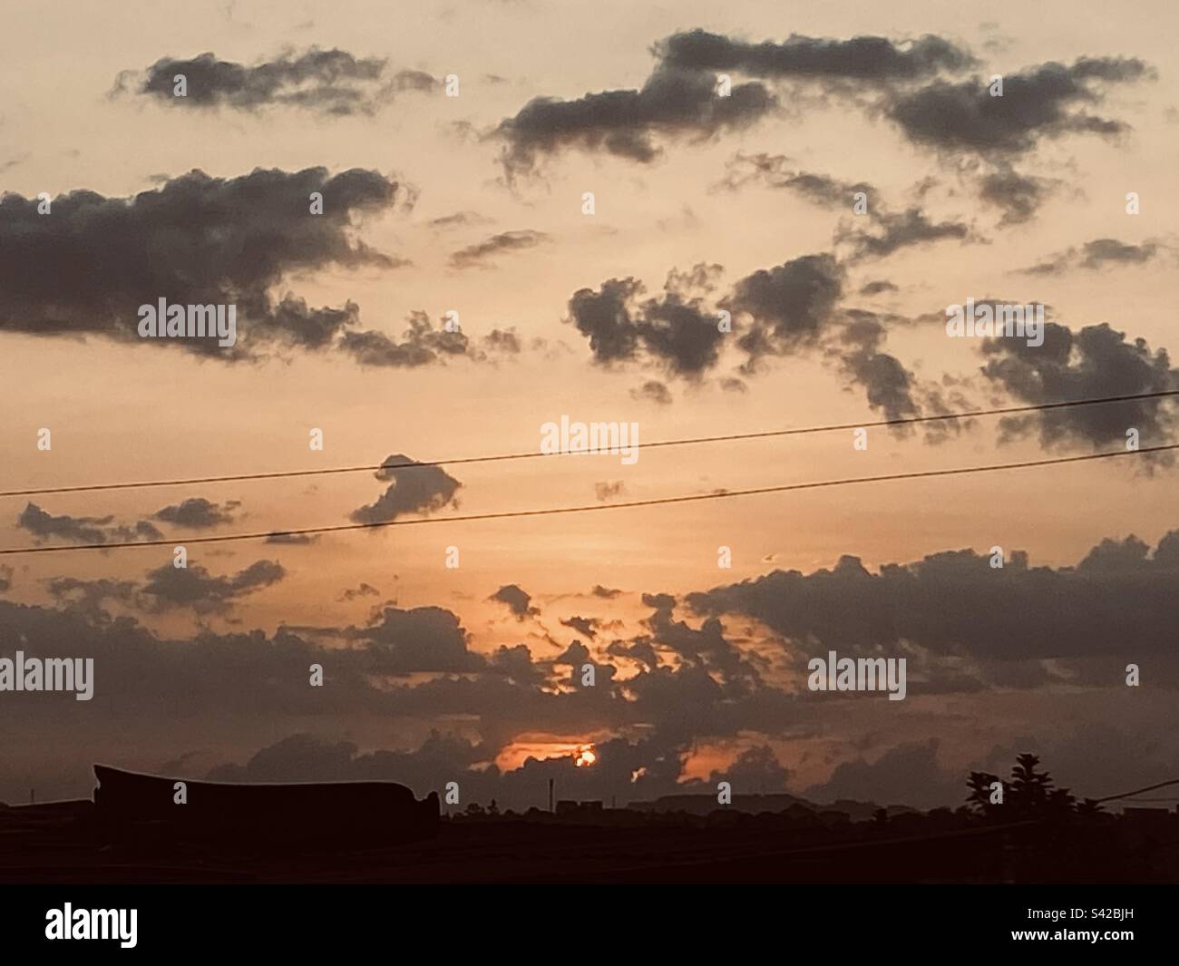 The rising sun over Kampala Stock Photo Alamy