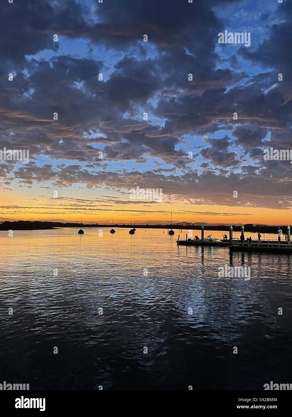 Beautiful sunset at the beach Stock Photo - Alamy