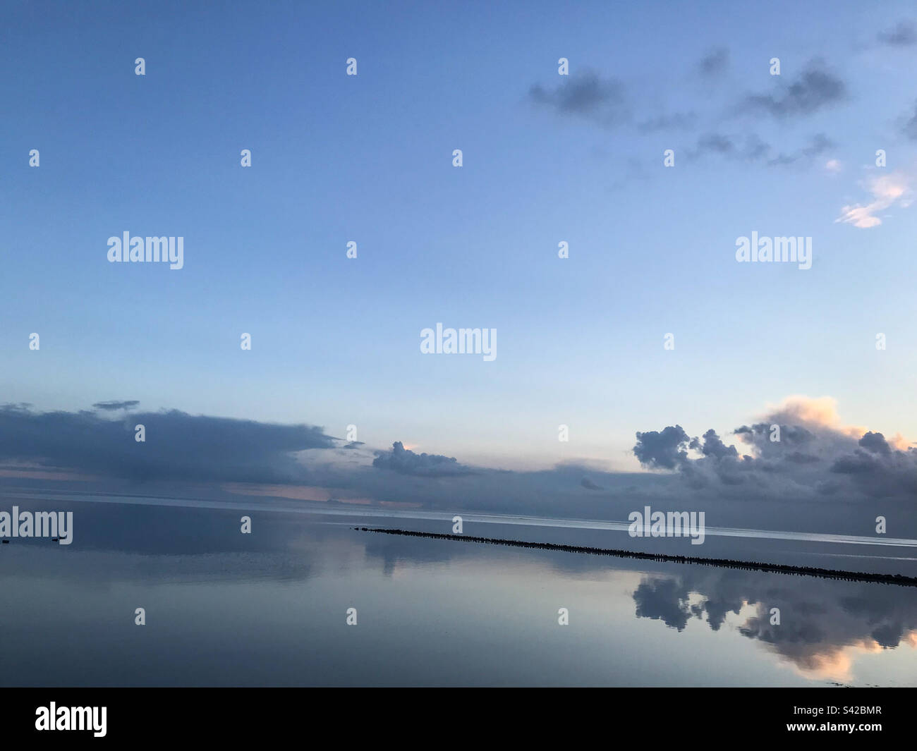 Mirror reflections on the island sea of Vlieland- Netherlands Stock Photo