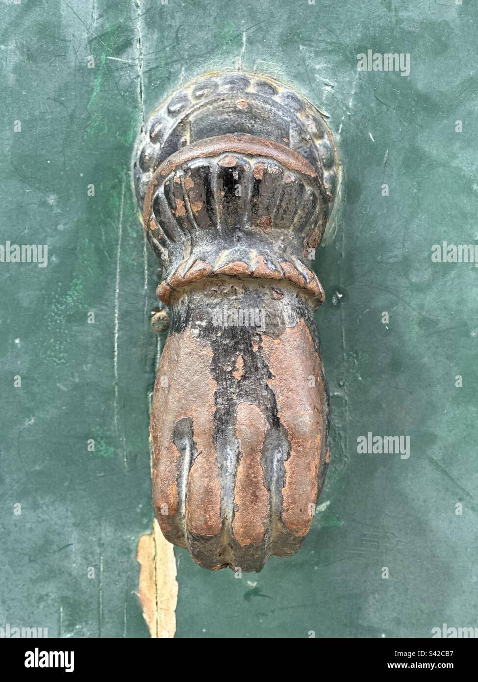 Old door knocker detail view - Smartphone Captured Stock Image