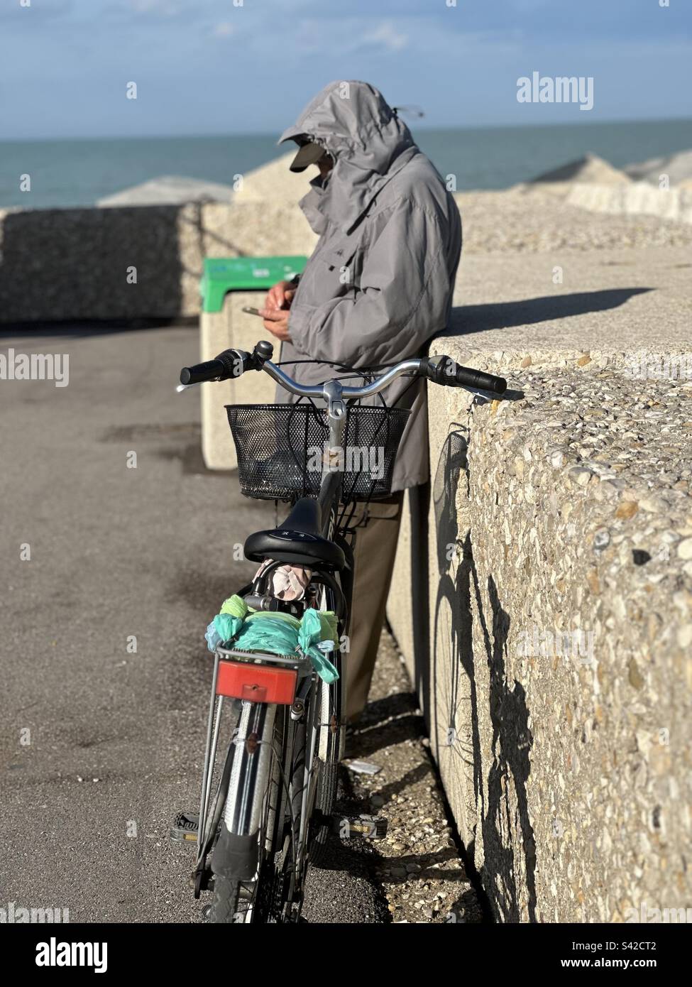 Old man connected with the world with his smartphone - Smartphone Captured Stock Image