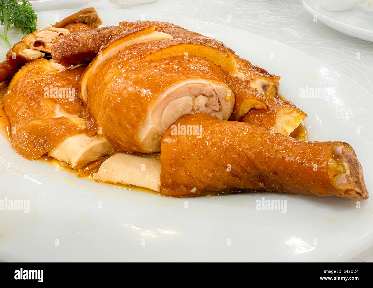 Plate of hainanese roast chicken in Chinese restaurant - Smartphone Captured Stock Image