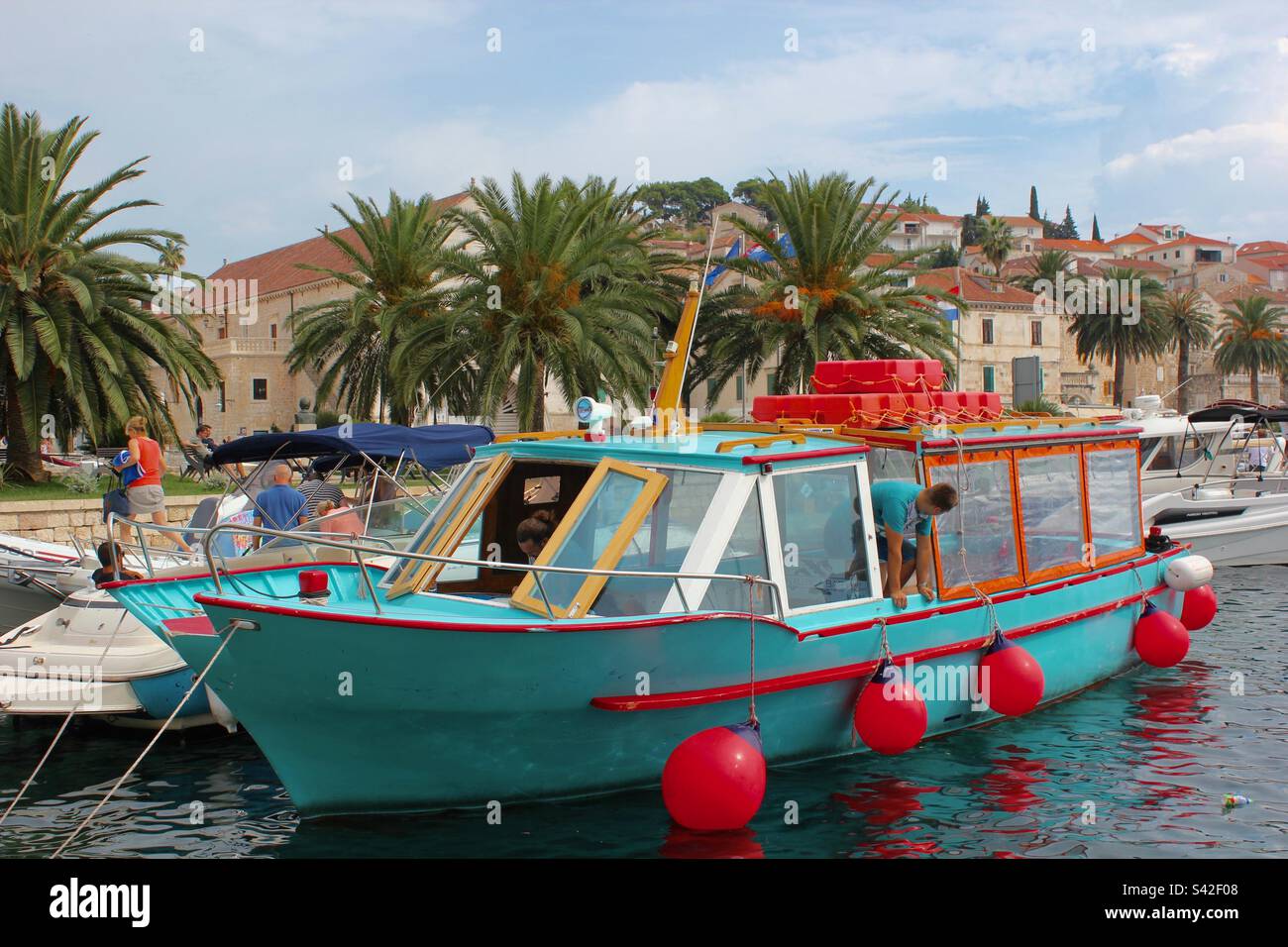 Turqoise boat with red trimmings, Split, Croatia - Smartphone Captured Stock Image