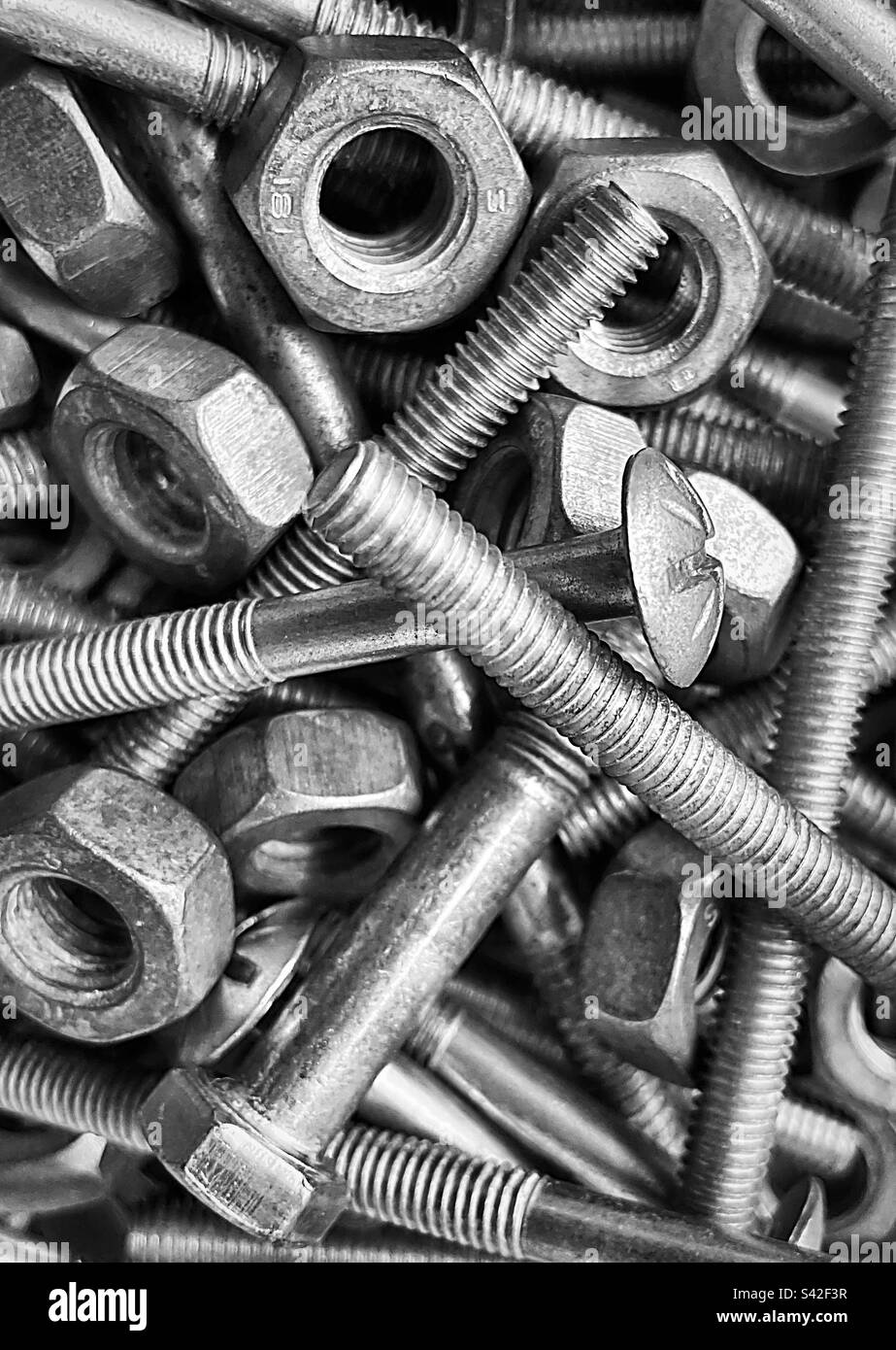 Metal nuts and bolts close up (Black & White) Stock Photo