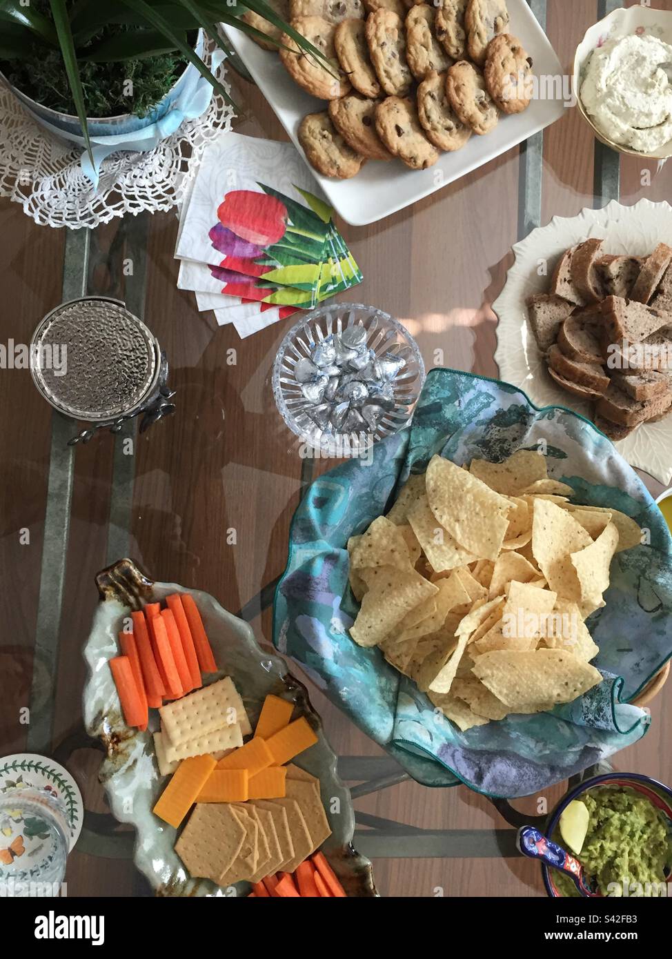 Table of snacks, entertaining appetizers, savory and sweet appetizers - Smartphone Captured Stock Image