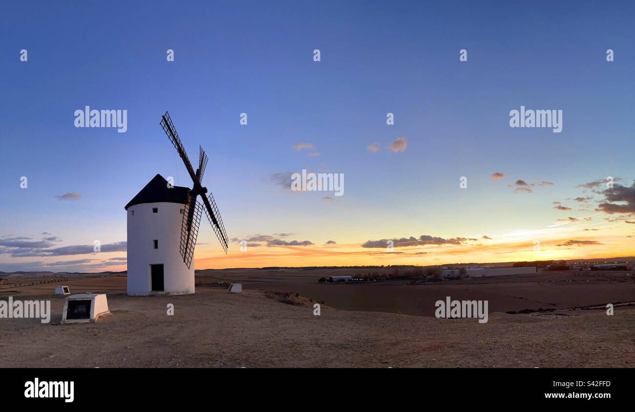 Windmill at nightfall. La Mancha, Spain. Stock Photo