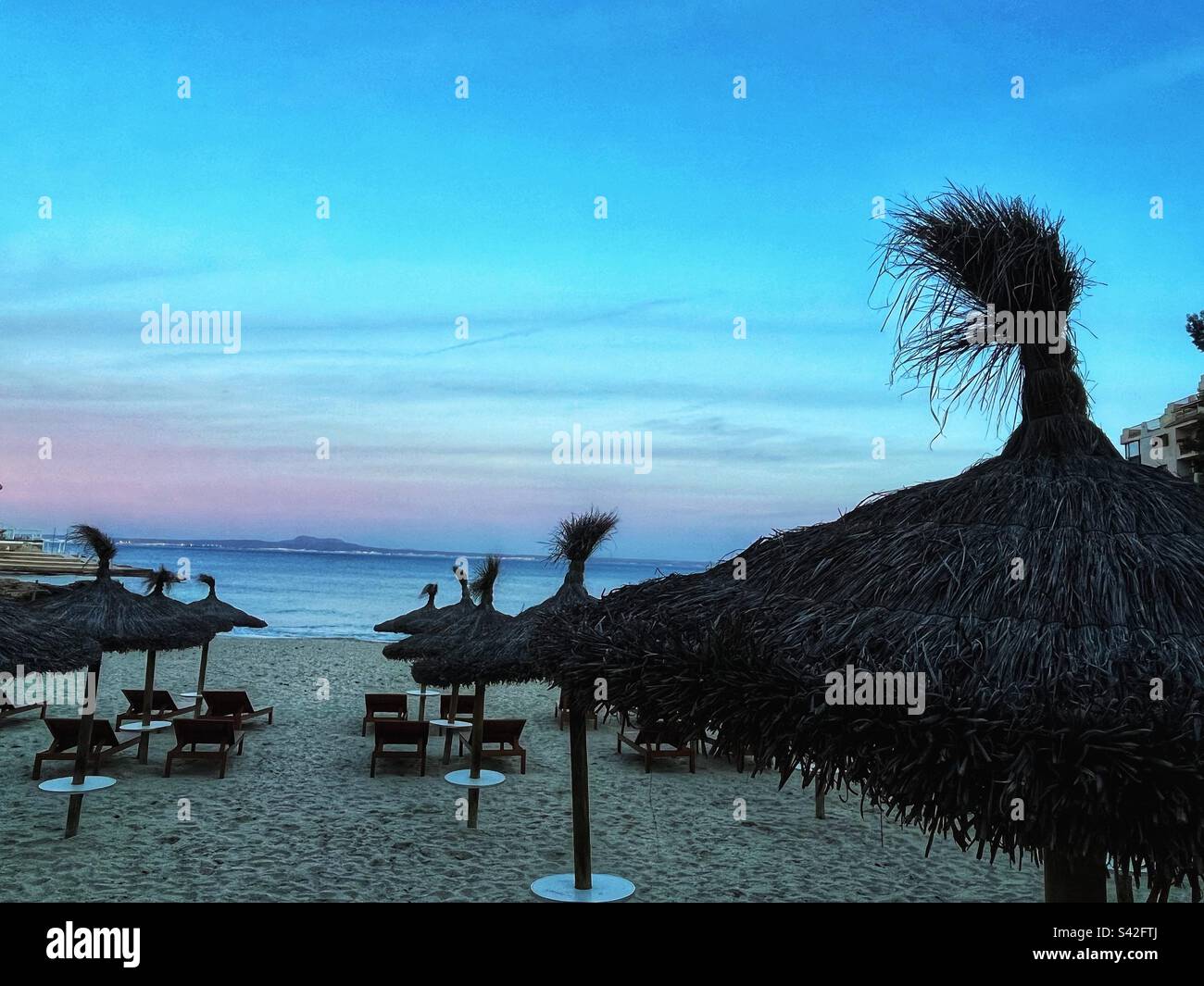 Playa de Ses Illetes, near Palma de Mallorca - a secluded beach with crystal clear water and clean beaches in the Mediterranean Sea one of the Spainish Balearic Islands - Smartphone Captured Stock Image