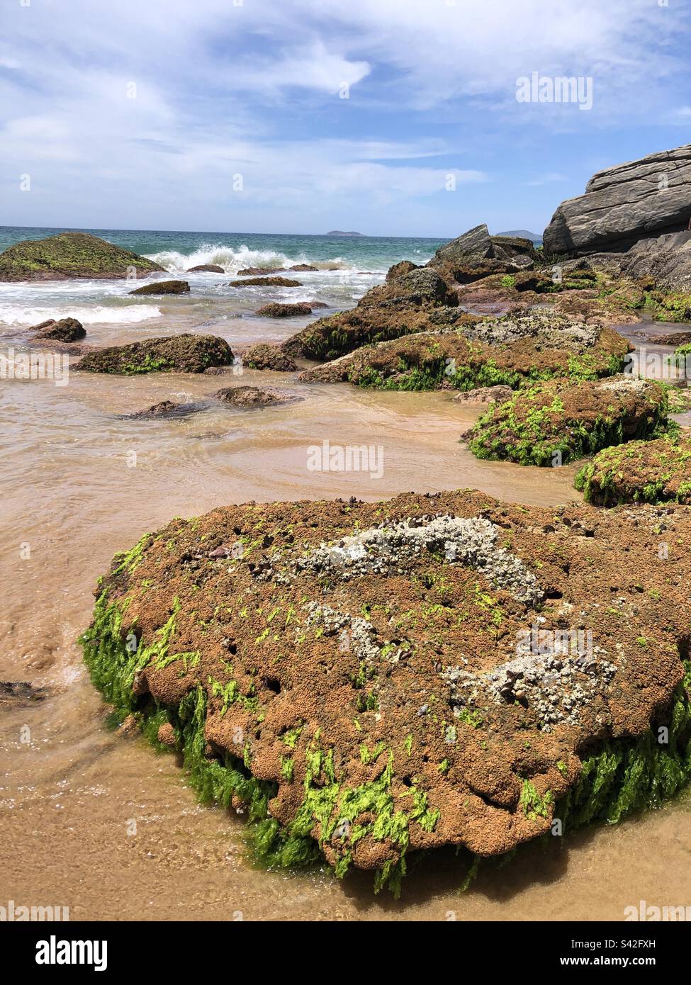 Rocky beach scene in Buzios, Brazil. Stock Photo