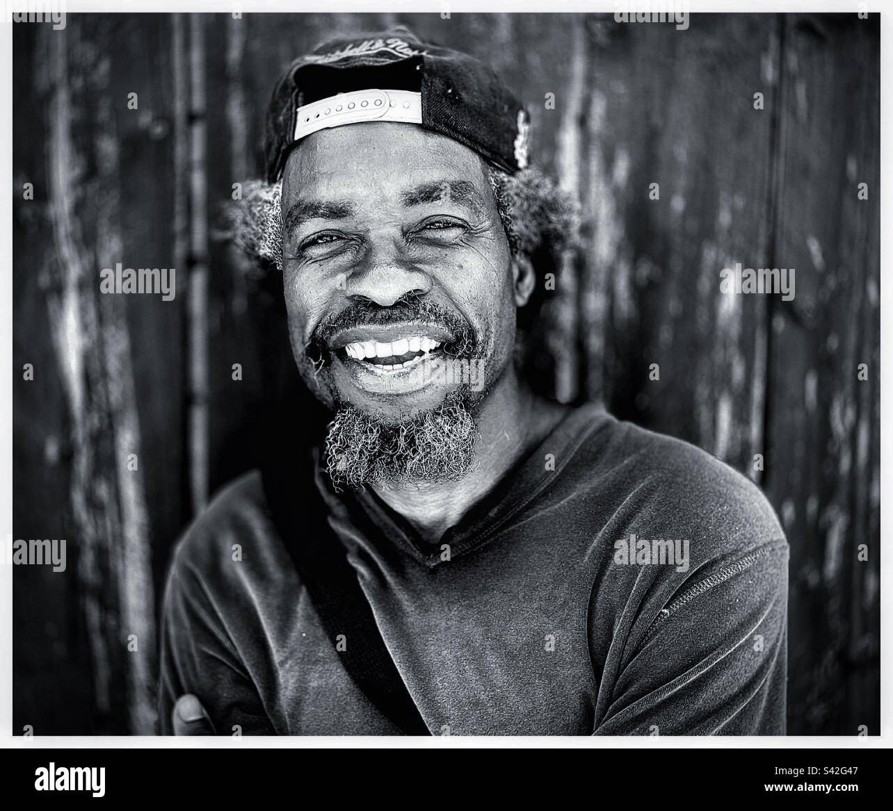 A smiling Black male. - Smartphone Captured Stock Image