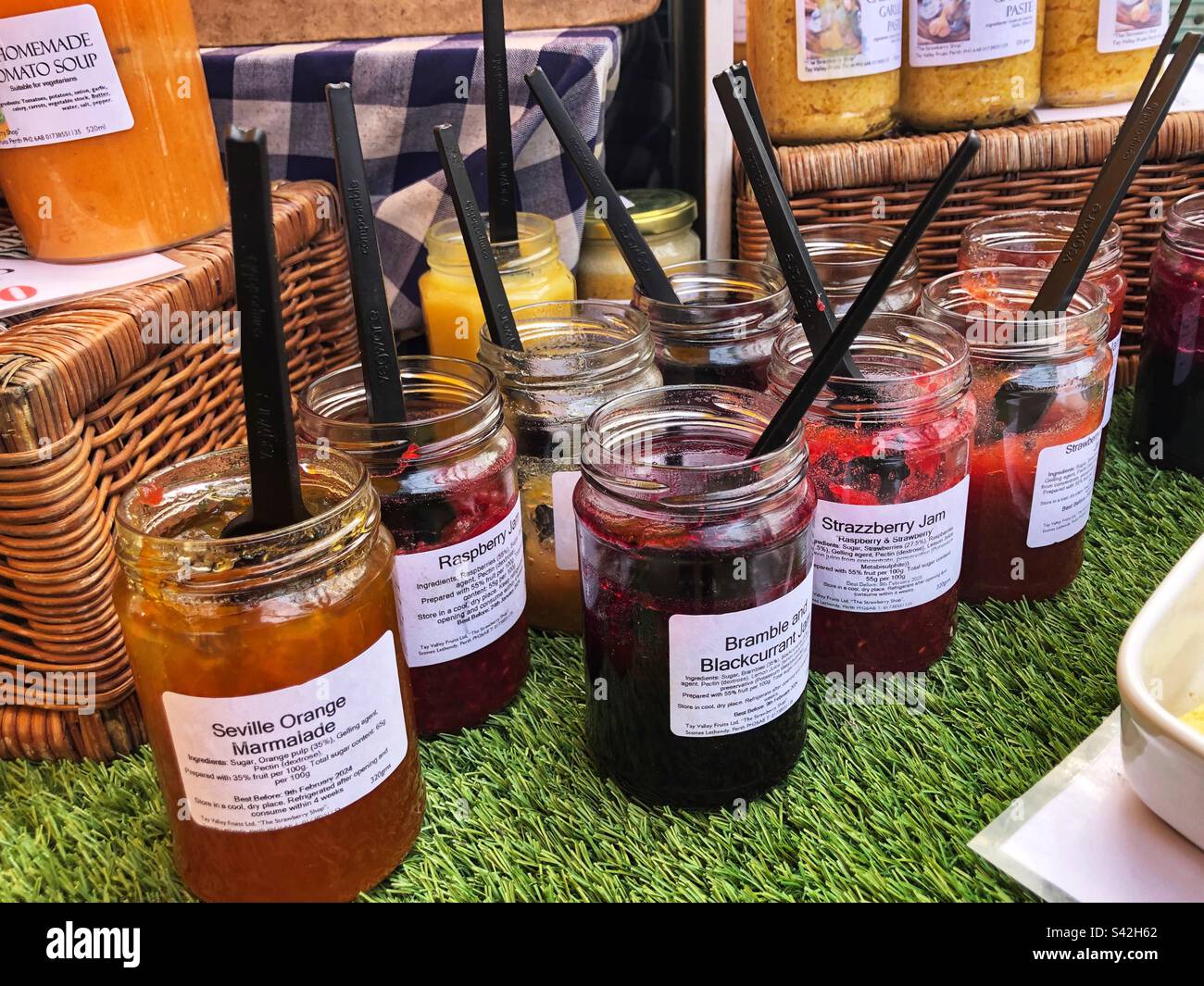 Speciality Fruit Jams and preserves tasting jars at local farmers