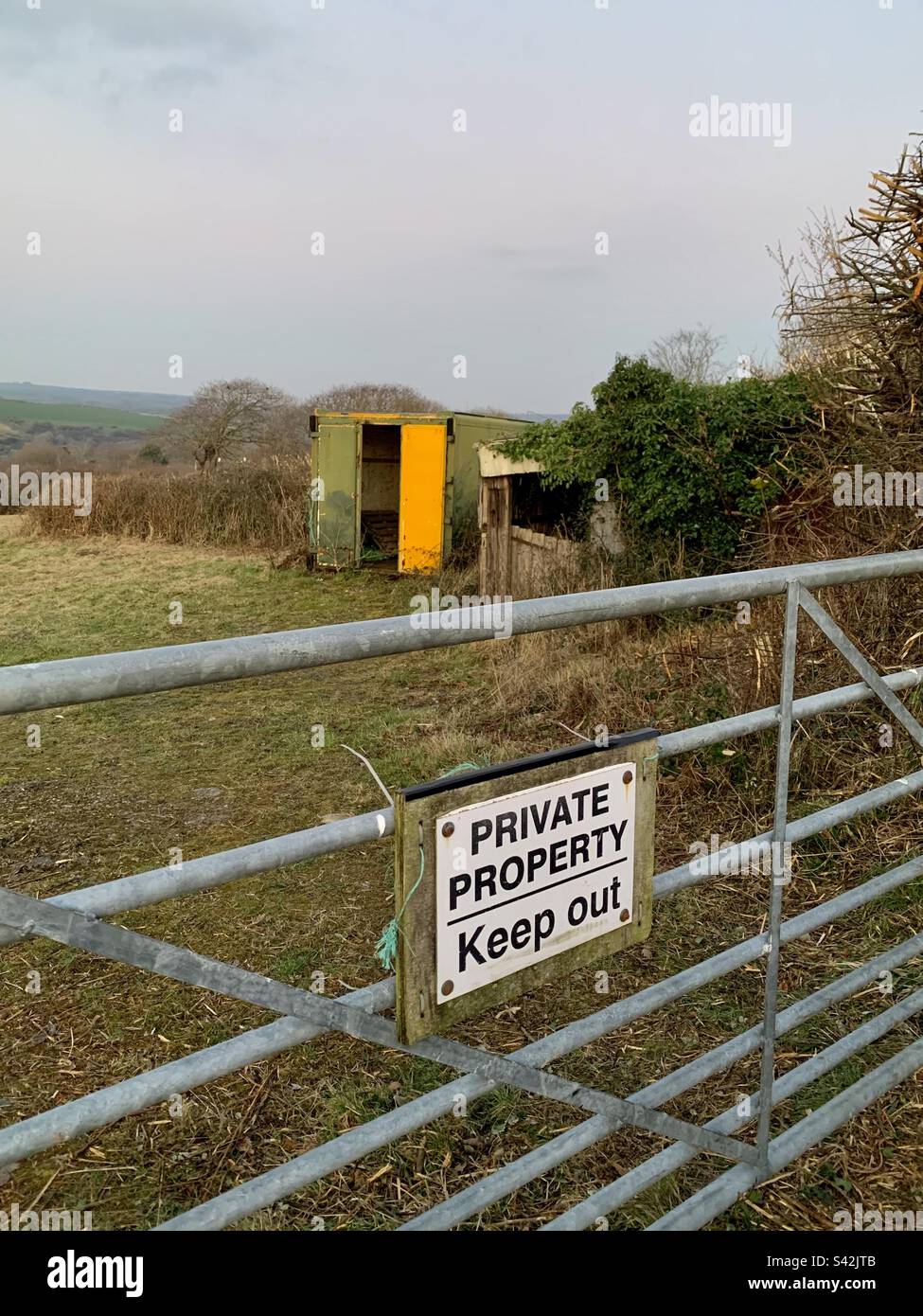 Private property keep out sign on gate - Smartphone Captured Stock Image