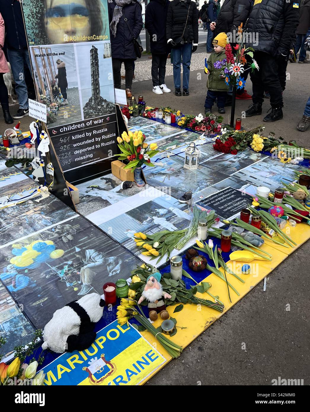 Memorial for dead children killed in war in Ukraine outside Russian embassy in Unter den Linden, Berlin, Germany - Smartphone Captured Stock Image
