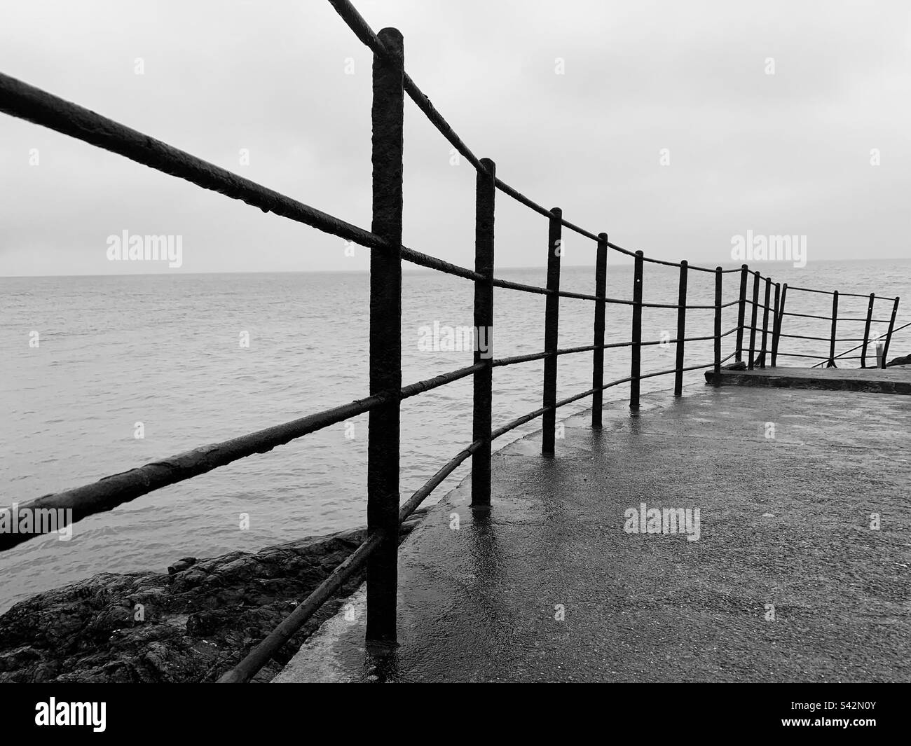 Old railings on seafront Stock Photo - Alamy