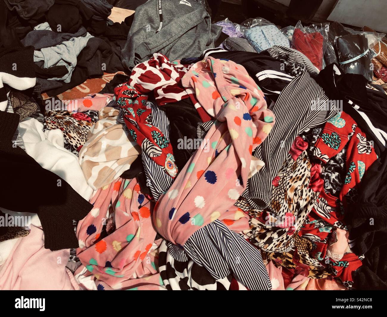 Pink and blue clothes hi-res stock photography and images - Alamy