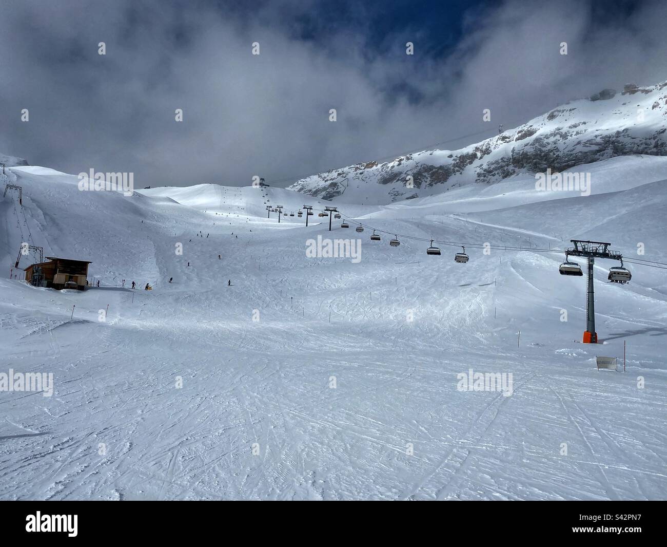 Skiing area and lift on top of the Zugspitze glacier, the highest German mountain. - Smartphone Captured Stock Image