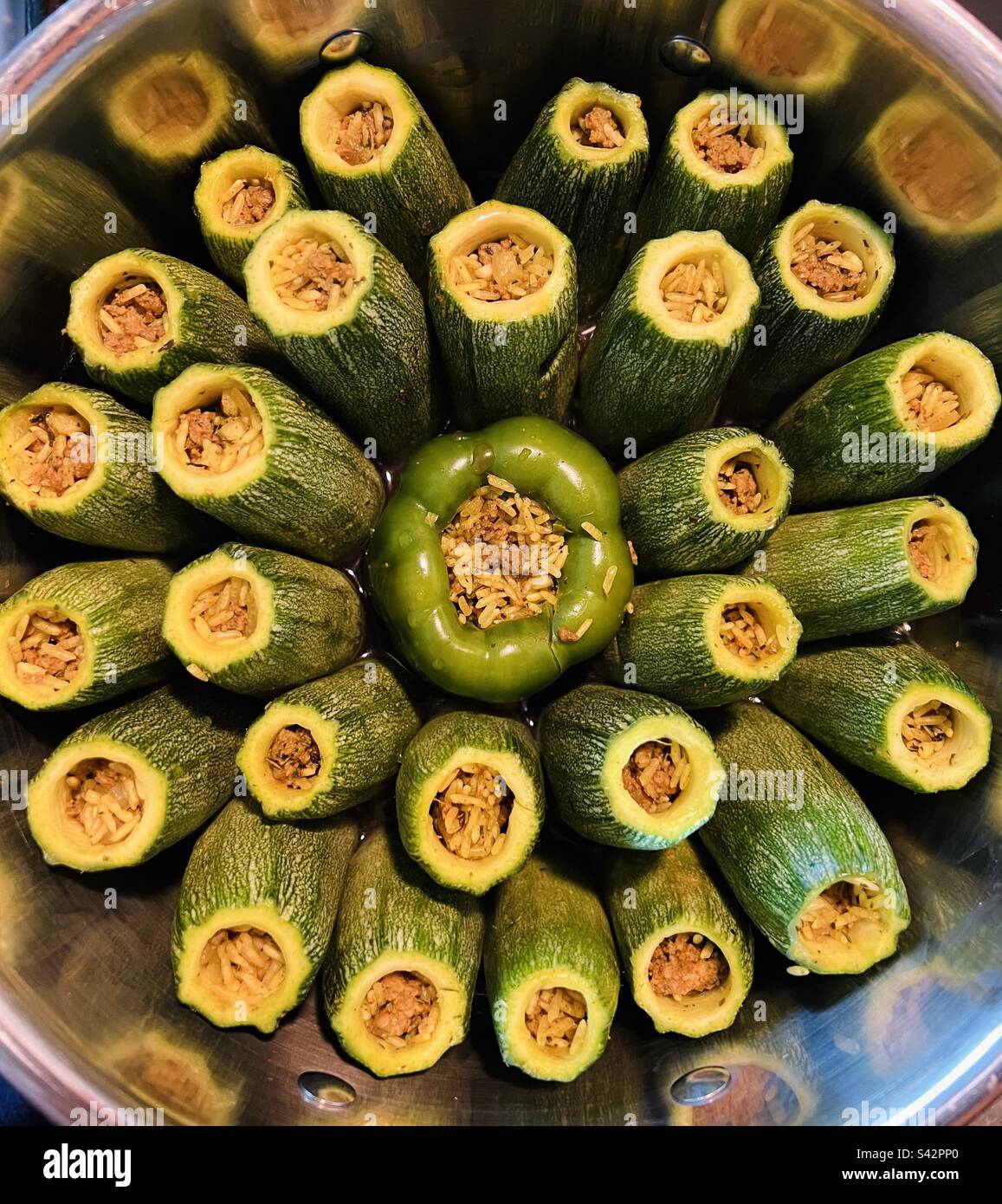 Zucchinis and green bell pepper stuffed with rice and ground beef Stock