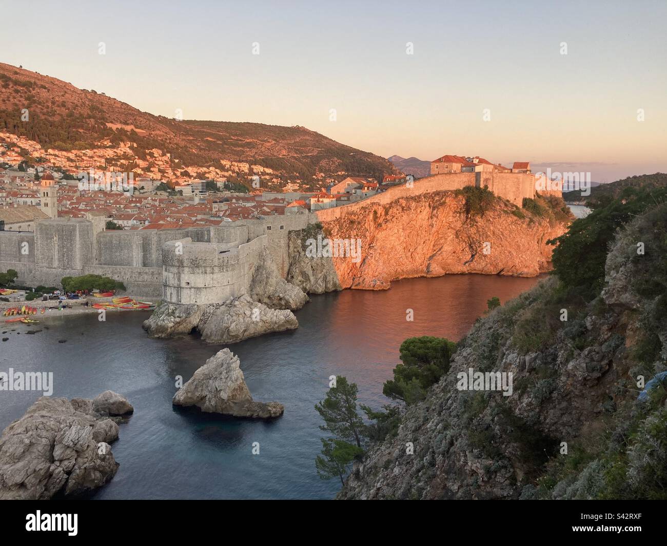 Dubrovnik old walls at sunset Stock Photo