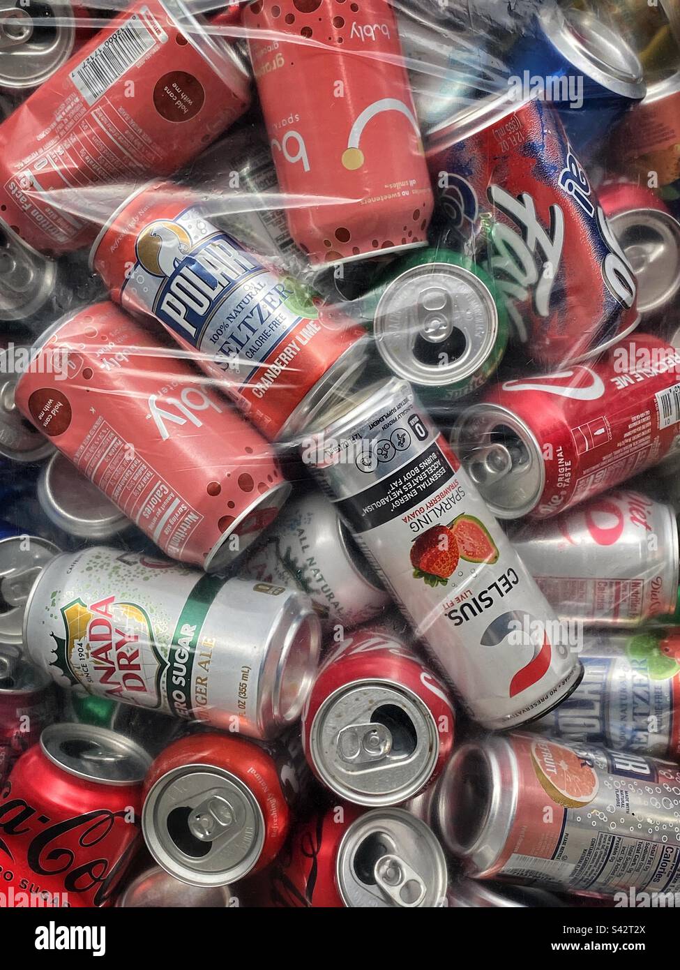 Soda cans inside a bag for recycling Stock Photo Alamy