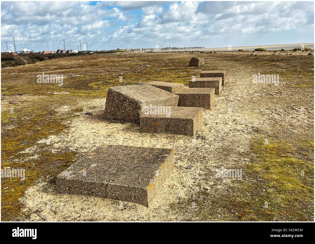 Concrete blocks as part of sea defences on Felixstowe beach - Smartphone Captured Stock Image