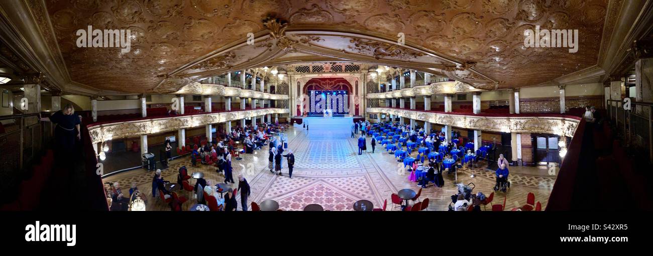 The Blackpool Tower ballroom in panorama, showing the dancers enjoying themselves, and the magnificent opulent decor of Frank Matcham’s interior - Smartphone Captured Stock Image