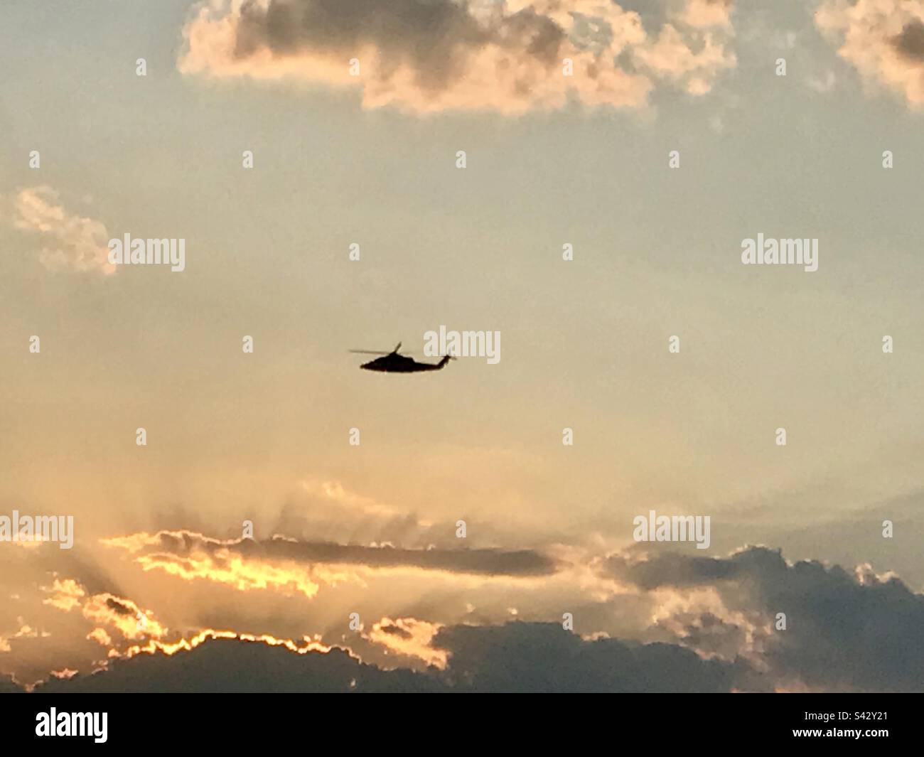 Helicopter flying through the clouds over the Hudson River, New York - Smartphone Captured Stock Image