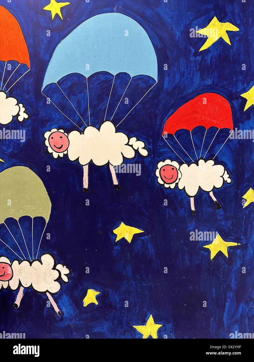 Flying Sheeps, conceptual and creative graffiti on a wall - Smartphone Captured Stock Image