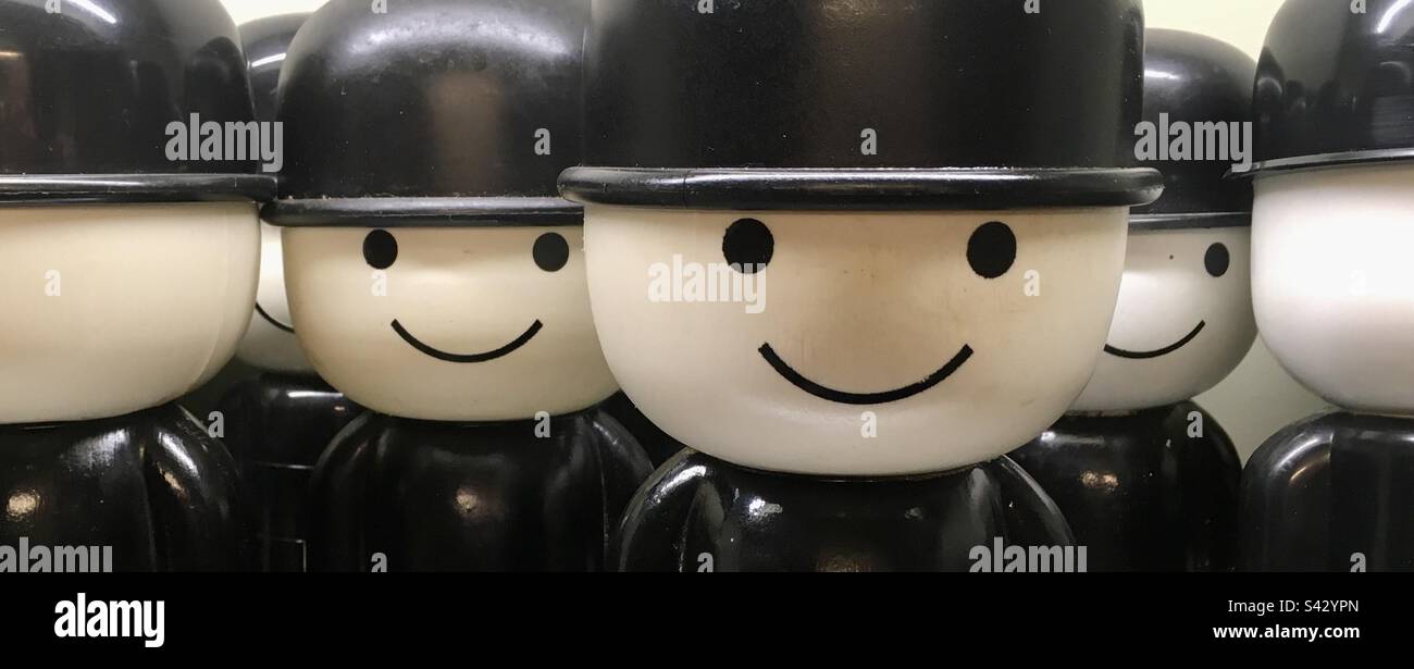 Bowler Hatted Plastic Men - Smartphone Captured Stock Image