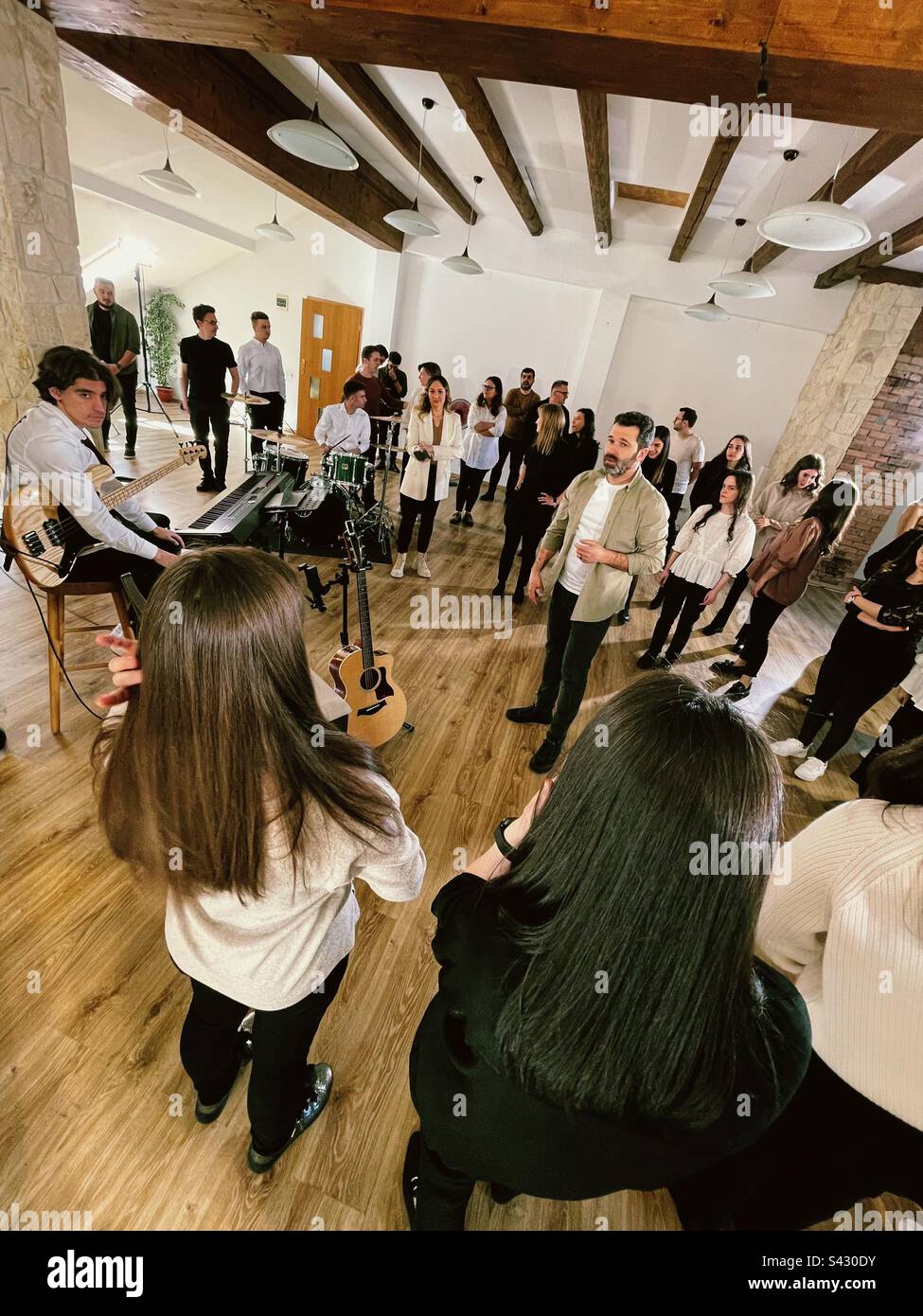 Choir band rehearsing for concert indoors Stock Photo Alamy