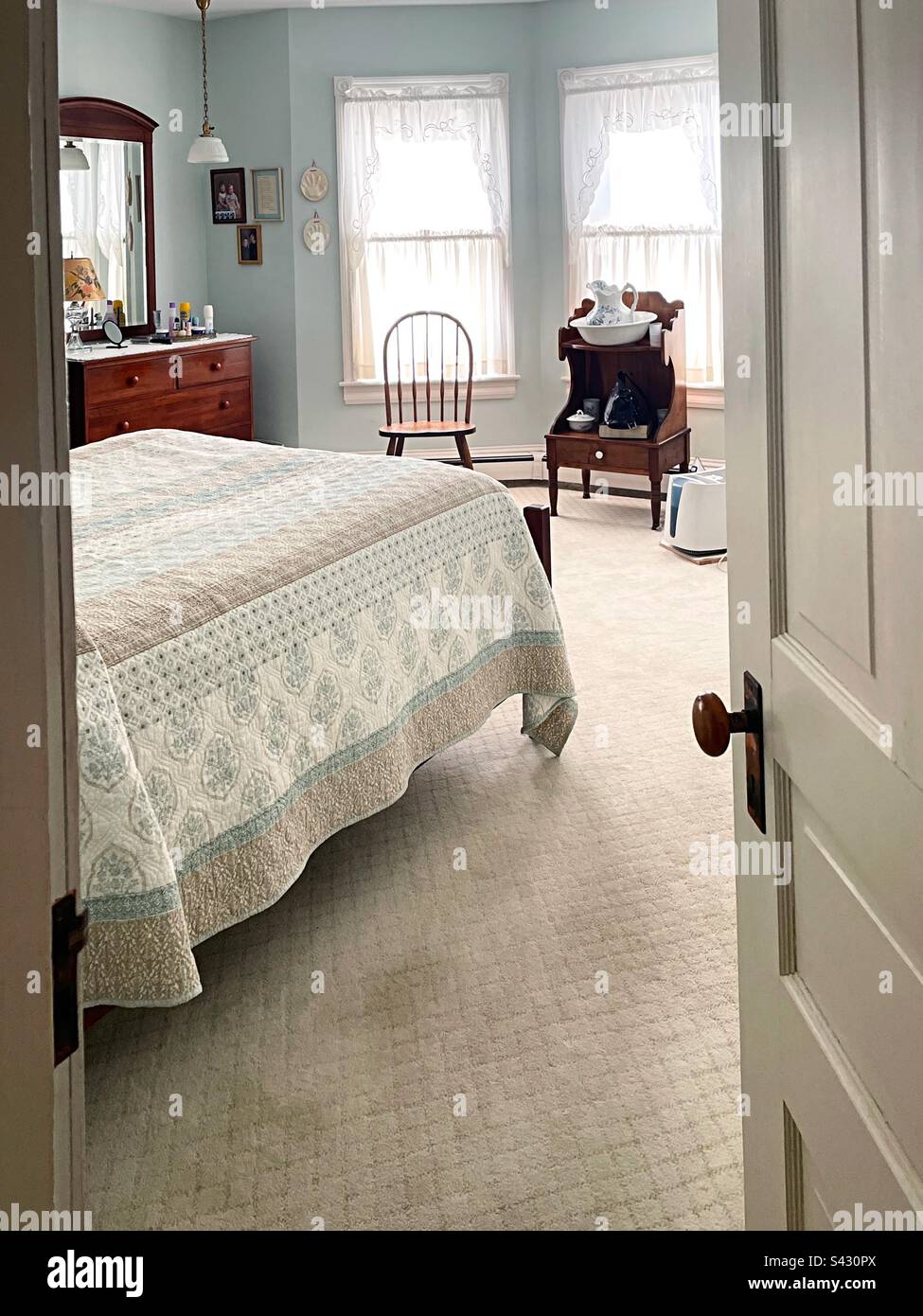 Interior of an early American bedroom, 2023, Bucks County, Pennsylvania, United States - Smartphone Captured Stock Image