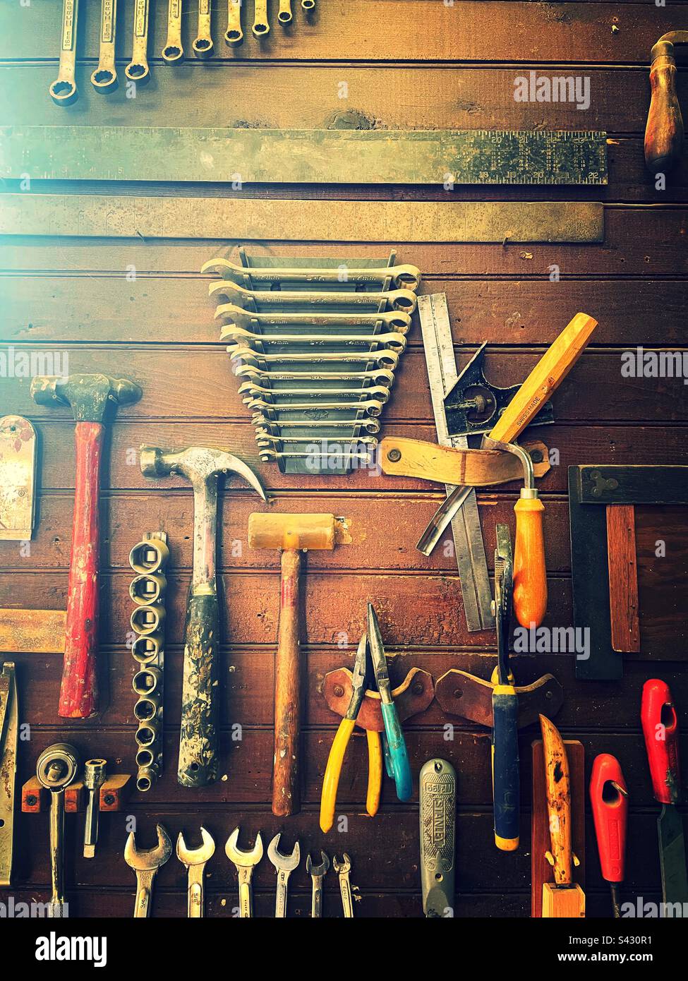 Still life of a vintage wall of tools in a residential workshop, 2023, Bucks County, Pennsylvania, USA - Smartphone Captured Stock Image